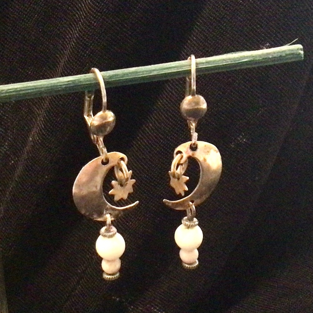 Go for the moon & stars with these polished brass earrings. 1.75” drop